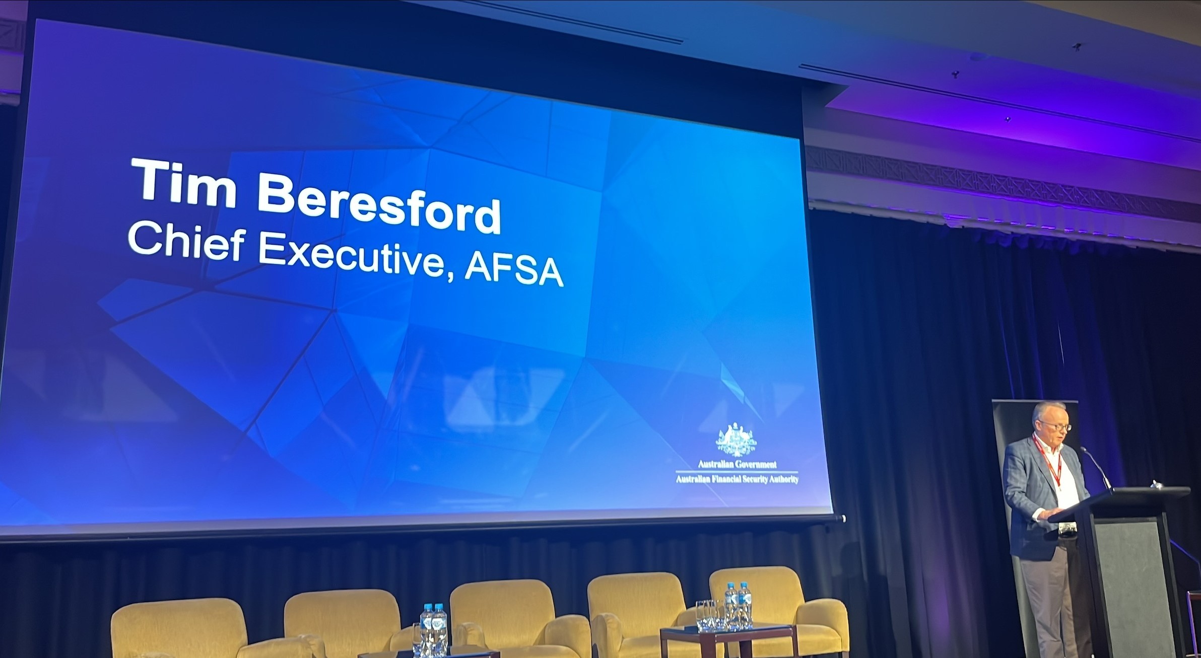 Tim Beresford, AFSA CEO, presenting with name and title on projected screen.